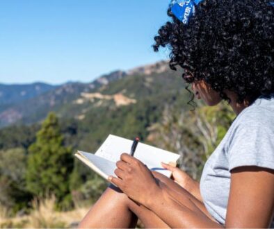 relevate-ketafusion-role-of-integration-after-ketamine-sessions-woman-writing-journal-in-nature-824x471