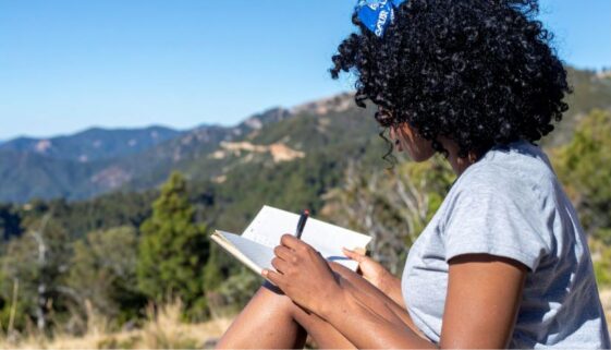 relevate-ketafusion-role-of-integration-after-ketamine-sessions-woman-writing-journal-in-nature-824x471